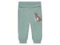 Pantalon bébé vert clair avec kangourou et koala.