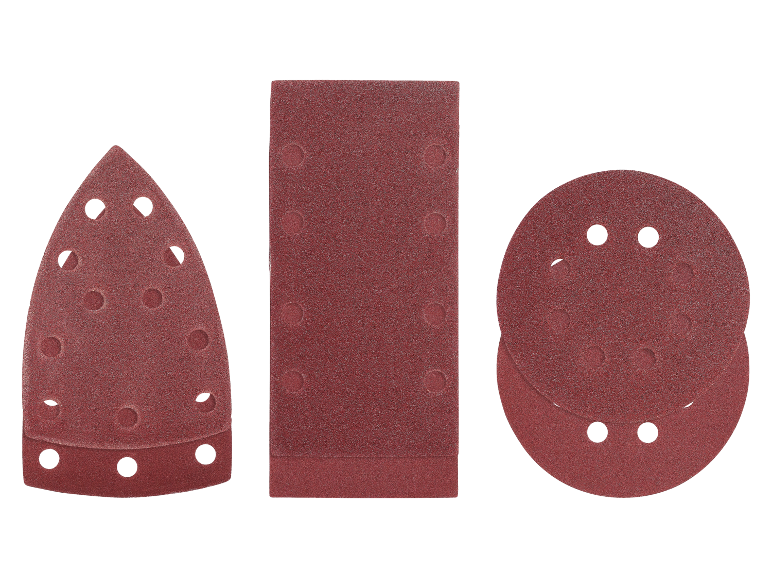 Assortiment de feuilles de papier de verre rouges de différentes formes : triangulaires, rectangulaires et circulaires.