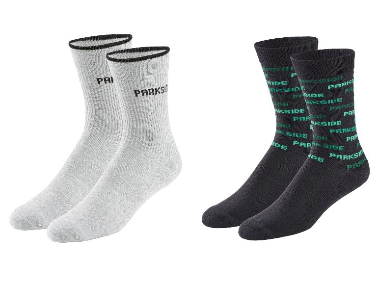 Deux paires de chaussettes Parkside : une paire grise avec des lettres noires et une paire noire avec des lettres vertes.