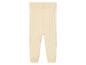 Leggings bébé en tricot côtelé beige.