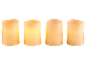 Quatre bougies LED de différentes tailles avec une lumière chaude et vacillante.
