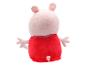 Une peluche de Peppa Pig avec une robe rouge.