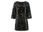 Une robe noire à paillettes avec des manches ¾.