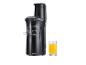 Un extracteur de jus SilverCrest avec un verre de jus d'orange.