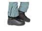 Pantalon de ski bleu avec fermeture éclair et bottes noires