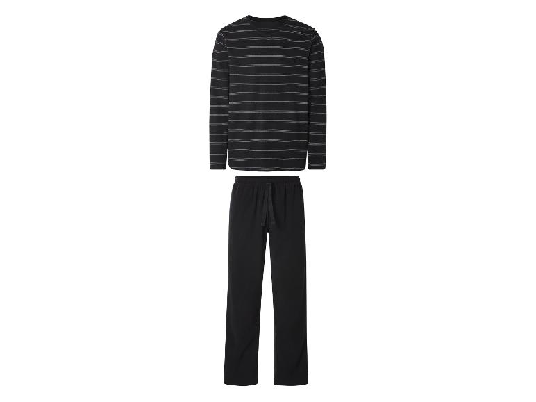 Pyjama noir avec un haut rayé à manches longues et un pantalon noir.