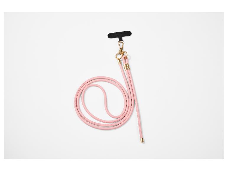 Cordon de téléphone rose avec détails dorés et connecteur noir.