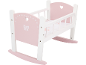 Berceau de poupée en bois rose et blanc avec décorations cœur et nœud.