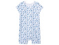 Une grenouillère blanche pour bébé avec un imprimé floral bleu.