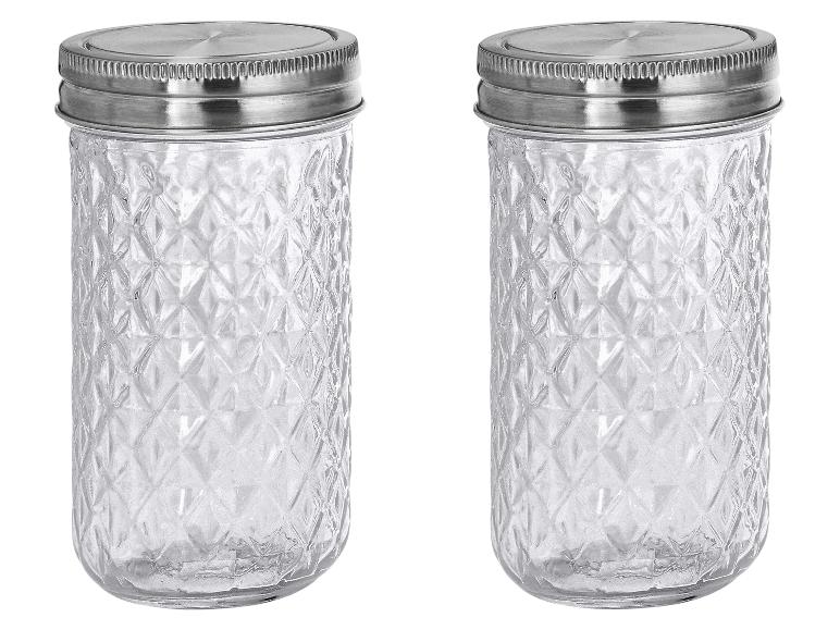 Deux bocaux en verre transparent avec motif diamant et couvercles argentés