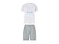Ensemble de pyjama blanc et gris avec logo CR7 et texte 'CRISTIANO RONALDO NIGHTWEAR'.
