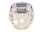 Lampe solaire de jardin en verre avec motif diamant et couvercle métallique.