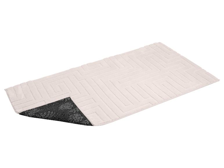 Tapis de bain beige clair à motif géométrique et envers antidérapant foncé à fleurs