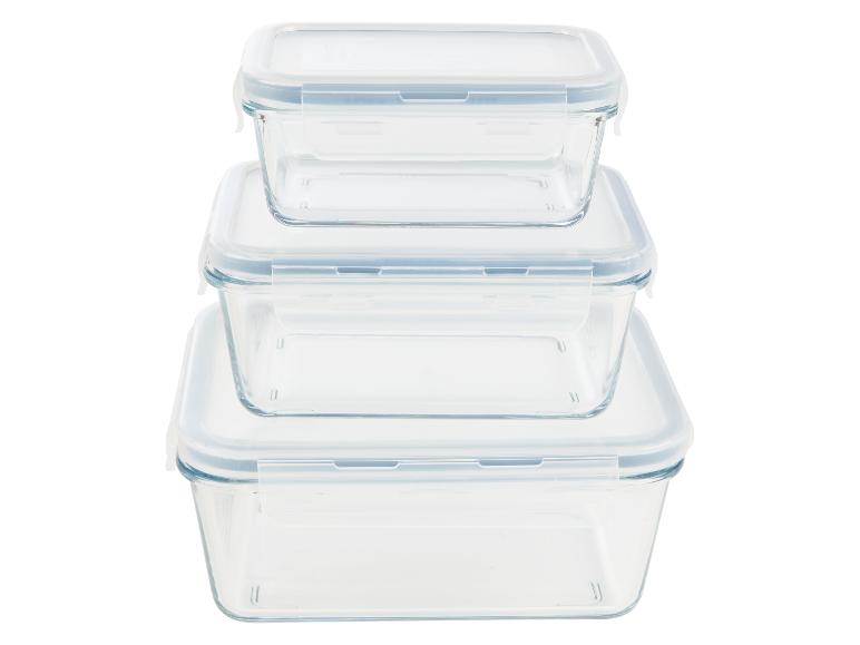 Trois récipients alimentaires en verre empilables avec couvercles.
