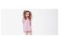 Petite fille portant une robe rose à motifs noeuds.