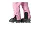 Pantalon de ski rose avec chaussures de ski noires