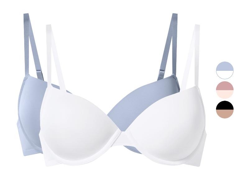 Ensemble de deux soutiens-gorge, un bleu clair et un blanc, avec des échantillons de couleurs.