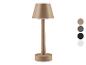 Lampe de table beige avec abat-jour rond.