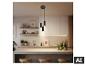 Suspension LED moderne noire de BRILONER au-dessus d'un îlot de cuisine. [image générée par l'IA]