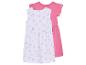 Deux robes pour filles : une à imprimé toucans roses et une rose unie.