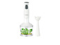Un mixeur plongeant Silvercrest blanc avec un bol et des feuilles de basilic.