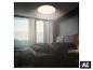 Plafonnier rond dans une chambre moderne avec vue sur la montagne.