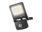Projecteur LED noir avec détecteur de mouvement, incliné sur un fond blanc.