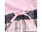Tissu rose et à carreaux avec un nœud décoratif rose