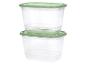 Deux récipients alimentaires en plastique transparent avec couvercles verts, empilés.