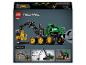Ensemble de jouets Technic comprenant un tracteur vert et un manipulateur sur l'emballage.