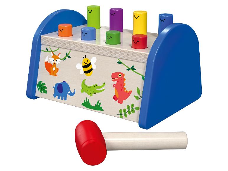 Jouet en bois pour marteler avec des blocs de couleurs et des animaux.