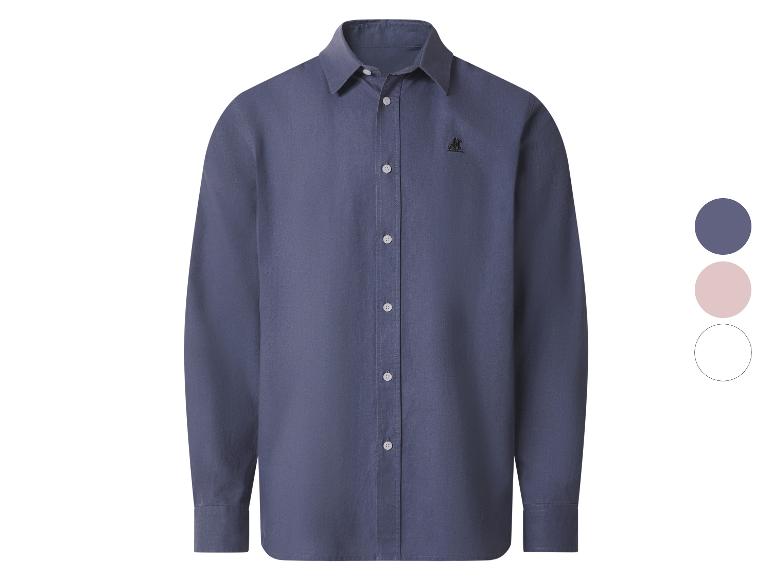 Chemise bleue à manches longues avec boutons blancs et logo brodé