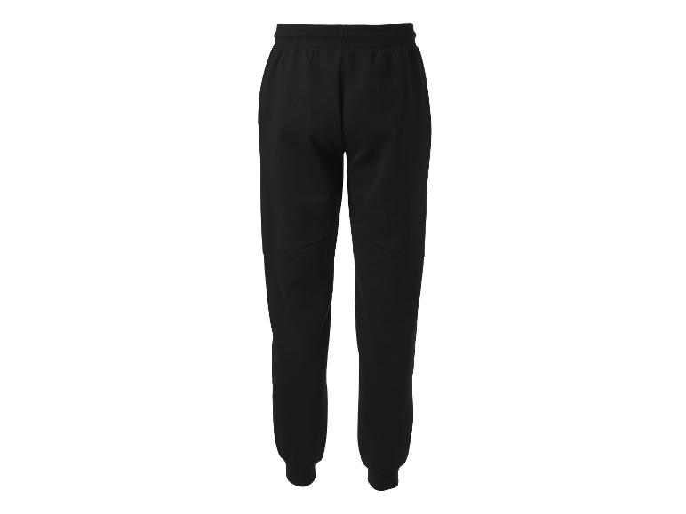 Pantalon de jogging noir pour homme avec taille et chevilles élastiques.
