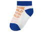 Chaussette blanche avec une bordure bleue et du texte orange 'Classic World'.