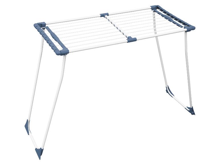 Séchoir à linge blanc avec des accents bleus, déplié.