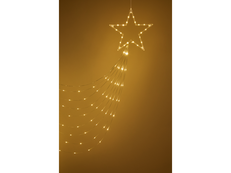 Guirlande lumineuse LED en forme d'étoile avec lumières en cascade sur fond doré.