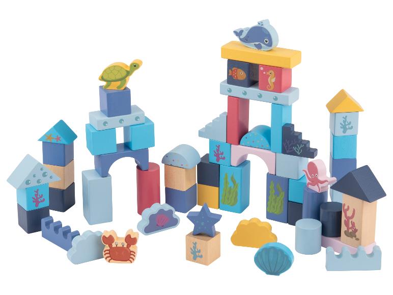 Ensemble de blocs de construction en bois sur le thème marin, avec animaux et éléments sous-marins.