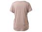 Haut de sport beige à manches courtes avec une petite poche zippée sur le côté.