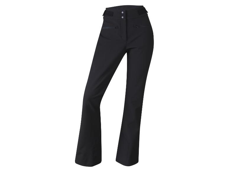 Pantalon de ski noir avec des poches et des fermetures éclair.