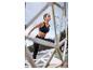 Femme s'étirant en vêtements de sport Kalenji.