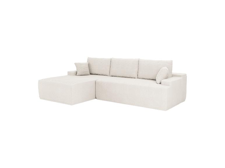 Canapé d'angle modulaire crème avec coussins, revêtu de tissu côtelé.