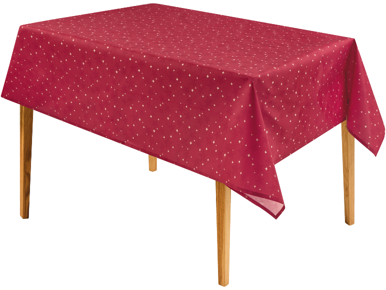 Nappe rouge à motif d'étoiles blanches sur une table en bois.