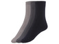Trois paires de chaussettes en gris foncé et noir.
