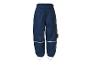 Pantalon de pluie bleu foncé pour enfants avec réflecteurs et élastiques aux pieds.