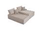 Canapé modulaire deux pièces avec coussins, rembourré en velours côtelé beige.