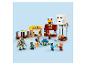 Ensemble LEGO Minecraft avec figurines, bâtiments et un Ghast.