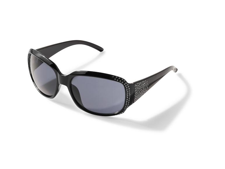 Lunettes de soleil noires avec des clous décoratifs sur la monture.