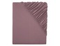 Un drap-housse de couleur rose.