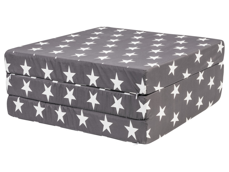 Un matelas pliable gris avec des étoiles blanches.