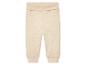 Jogging bébé beige clair.